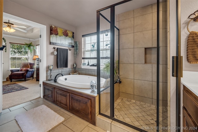 bathroom with tile patterned floors, ceiling fan, and independent shower and bath