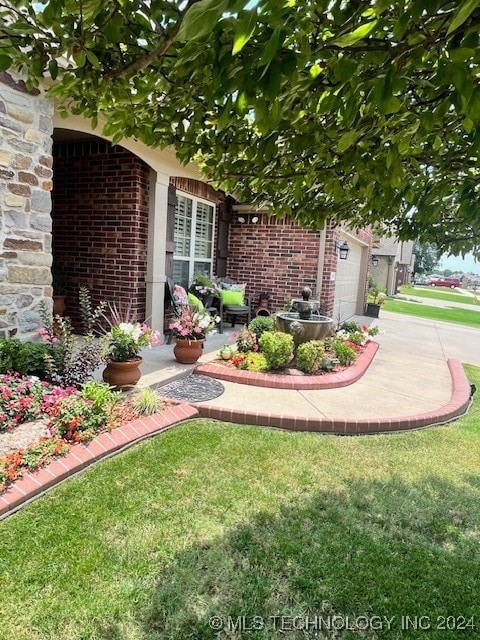 view of yard with a garage