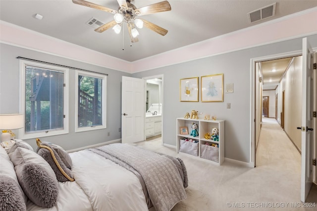 bedroom with visible vents, baseboards, and light colored carpet