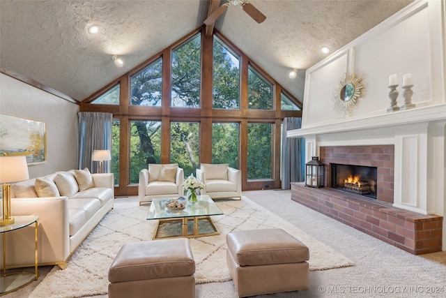 carpeted living room featuring high vaulted ceiling, beam ceiling, a healthy amount of sunlight, and a textured ceiling