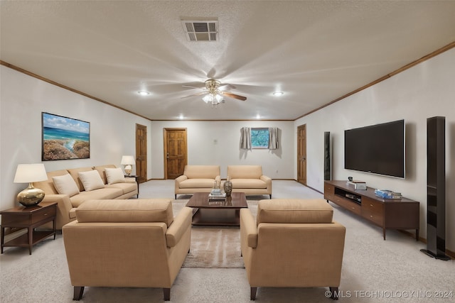 carpeted living room with ceiling fan and crown molding