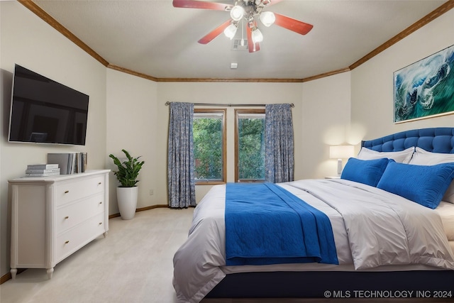 bedroom with baseboards, light carpet, ceiling fan, and crown molding