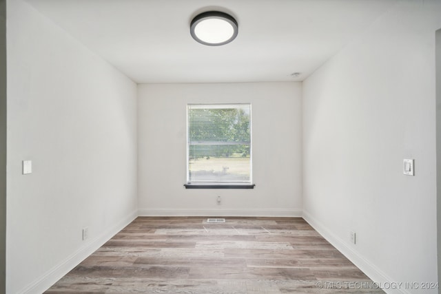 empty room featuring light hardwood / wood-style floors