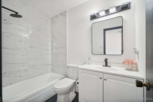 full bathroom with vanity, tiled shower / bath combo, and toilet