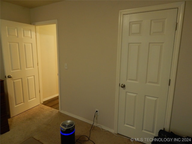 unfurnished bedroom with carpet