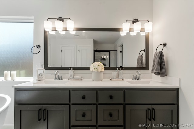 bathroom with plus walk in shower and vanity