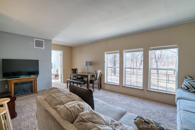 living room with light colored carpet