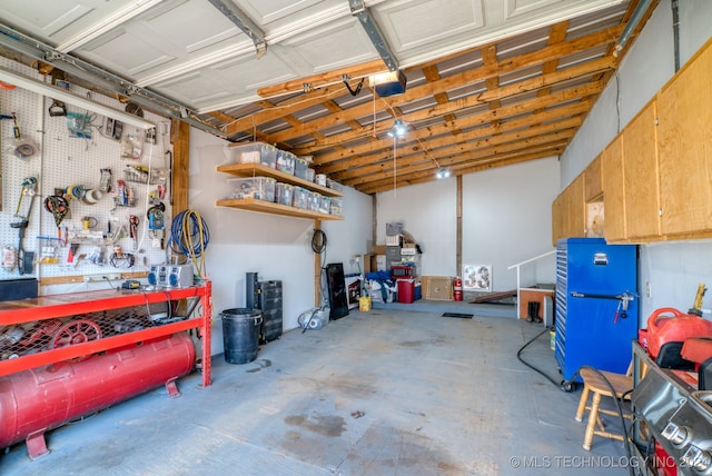 garage with a workshop area