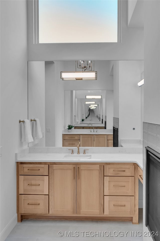 bathroom featuring tile patterned floors and sink