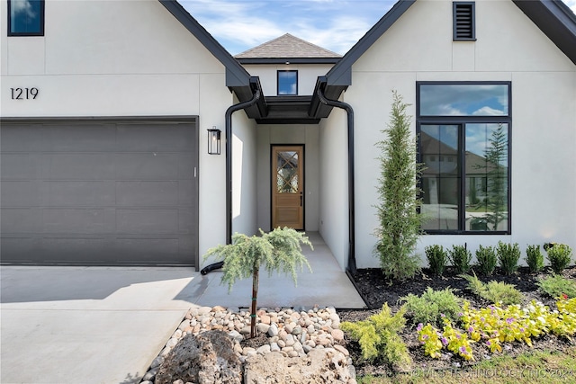 property entrance featuring a garage