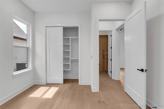 unfurnished bedroom featuring light hardwood / wood-style floors