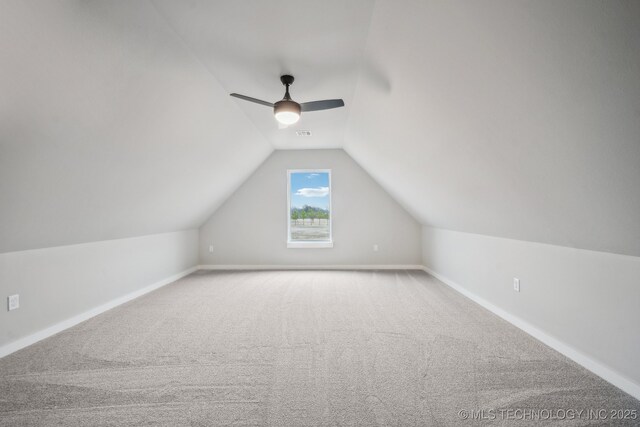 17599 S Harvard Ave, Mounds, OK 74047 - bonus room featuring vaulted ceiling, ceiling fan, carpet floors, and baseboards