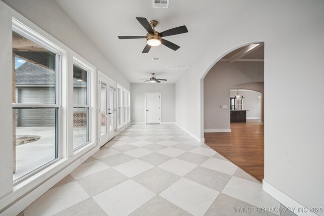 17599 S Harvard Ave, Mounds, OK 74047 - hallway with arched walkways and baseboards