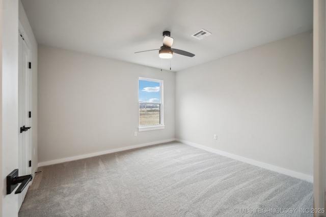 carpeted empty room with ceiling fan