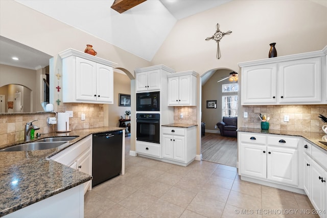 kitchen featuring white cabinets, sink, tasteful backsplash, and black appliances