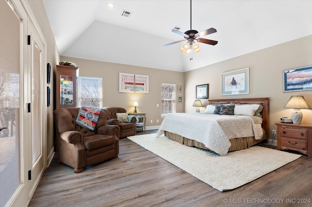 bedroom featuring wood-type flooring, lofted ceiling, and ceiling fan