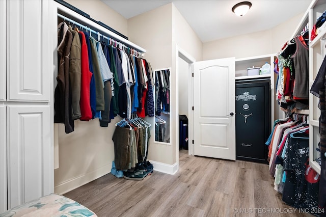 walk in closet featuring light wood-type flooring