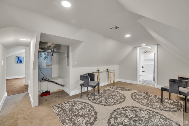 bonus room featuring vaulted ceiling and carpet flooring