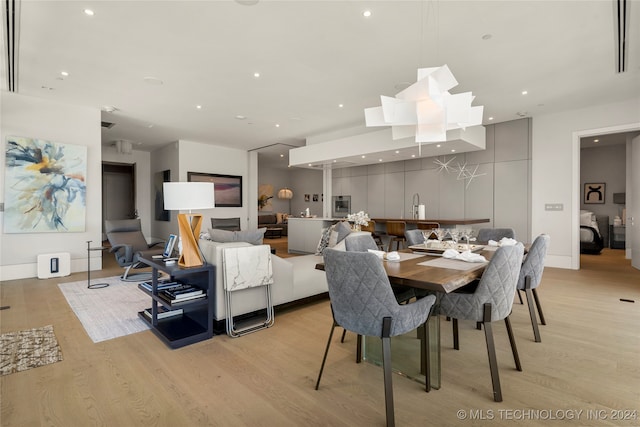 dining room featuring light wood-type flooring