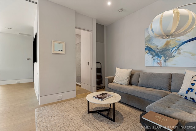 living room with light hardwood / wood-style floors