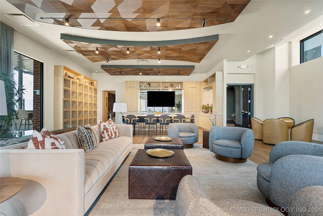 living room with light hardwood / wood-style flooring