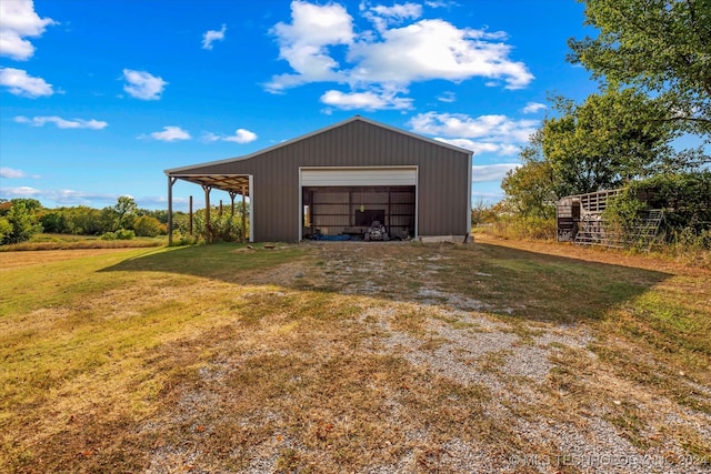 garage with a yard