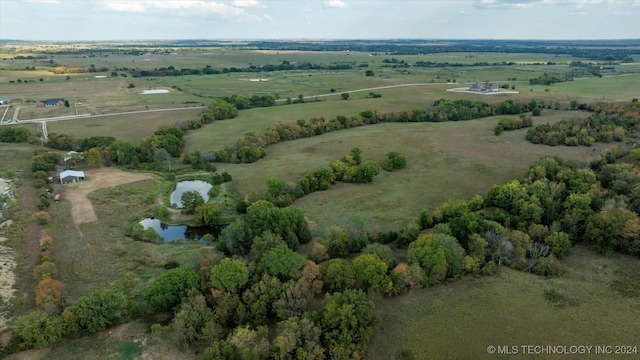bird's eye view with a water view and a rural view
