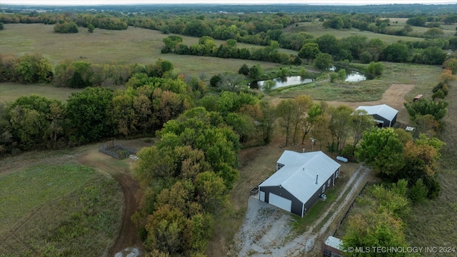 bird's eye view featuring a water view and a rural view