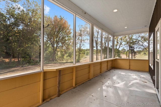 unfurnished sunroom with a healthy amount of sunlight