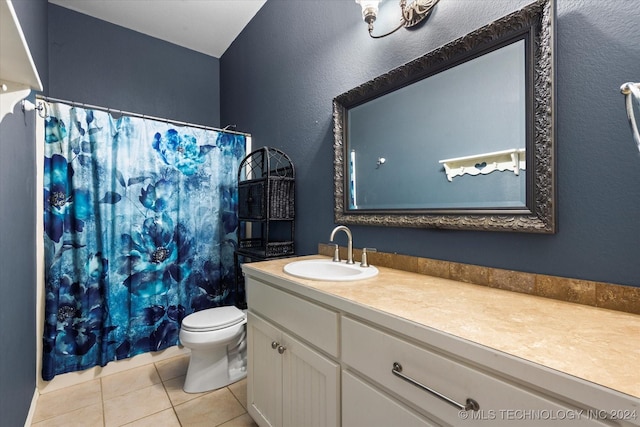 full bath featuring toilet, tile patterned floors, a shower with shower curtain, and vanity