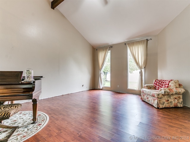 sitting room featuring high vaulted ceiling, beam ceiling, and dark hardwood / wood-style floors