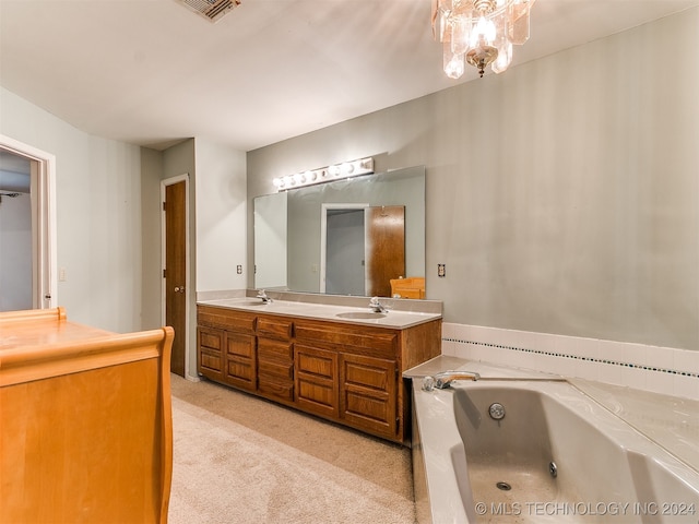 bathroom featuring vanity and a bathtub