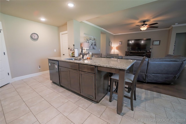 kitchen with light stone counters, stainless steel dishwasher, ceiling fan, crown molding, and sink