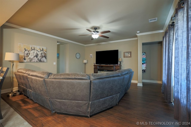 living room featuring ceiling fan, crown molding, and dark hardwood / wood-style floors