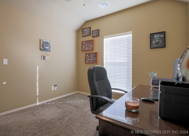 carpeted office space with ceiling fan and lofted ceiling