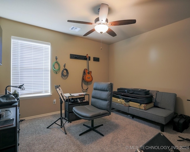 office space with ceiling fan and carpet floors