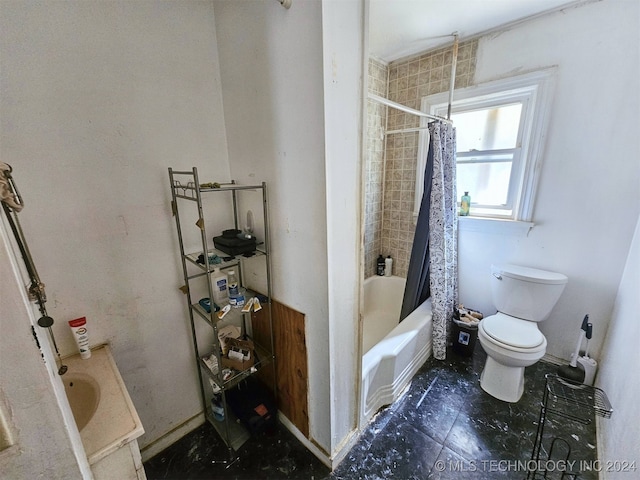 full bathroom with vanity, shower / tub combo, and toilet