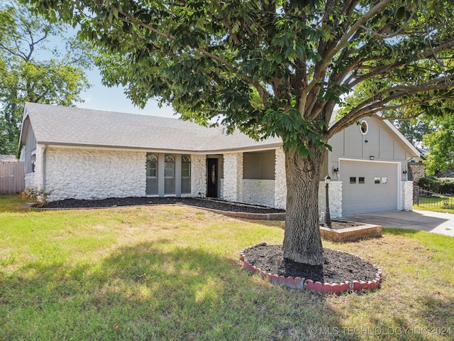 ranch-style house with a front lawn