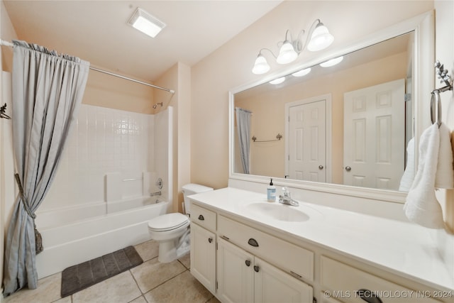 full bathroom with shower / bath combo with shower curtain, tile patterned flooring, vanity, and toilet