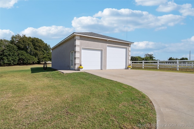 detached garage with fence