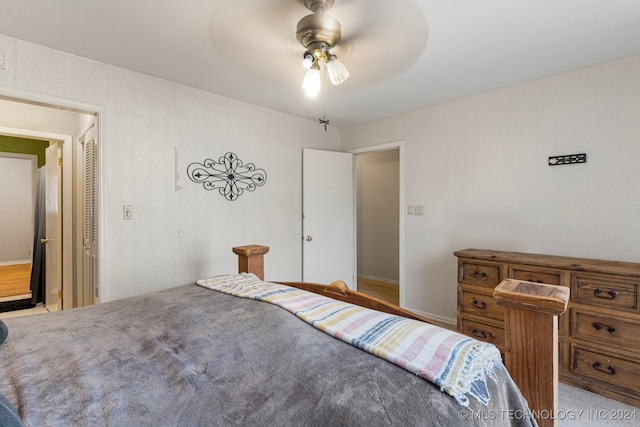 unfurnished bedroom featuring light colored carpet and ceiling fan