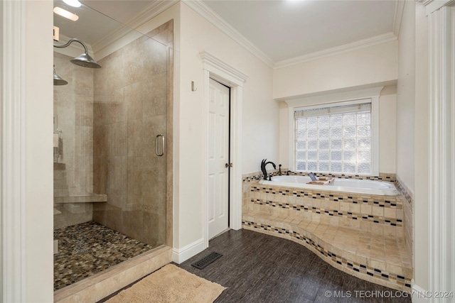 bathroom featuring crown molding, independent shower and bath, and hardwood / wood-style floors