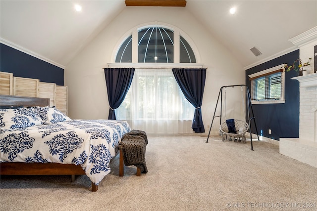 carpeted bedroom featuring lofted ceiling and ornamental molding