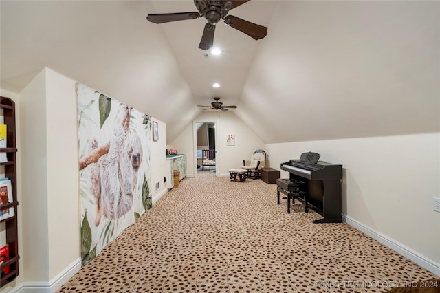 additional living space featuring ceiling fan and vaulted ceiling