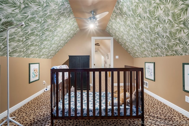 bonus room with carpet, ceiling fan, and vaulted ceiling