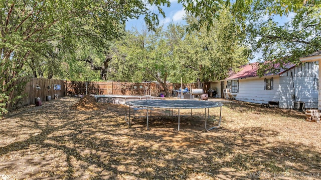 view of yard with a trampoline