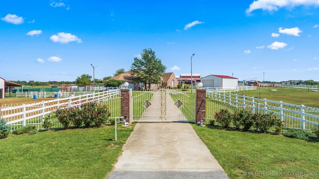 view of home's community featuring a yard