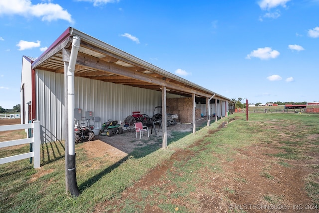 exterior space featuring an outbuilding