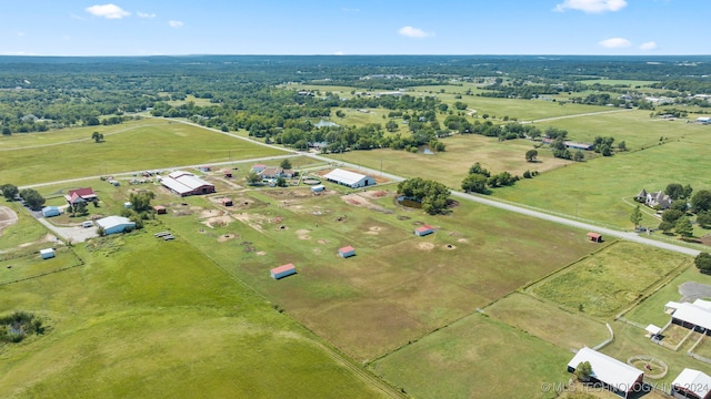 birds eye view of property featuring a rural view