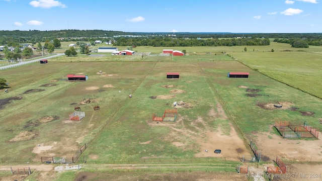 birds eye view of property featuring a rural view